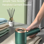 Portable garment steamer for wrinkle removal and clothing care